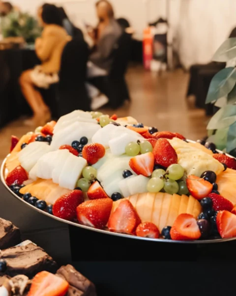 A platter of fresh seasonal fruit and berries